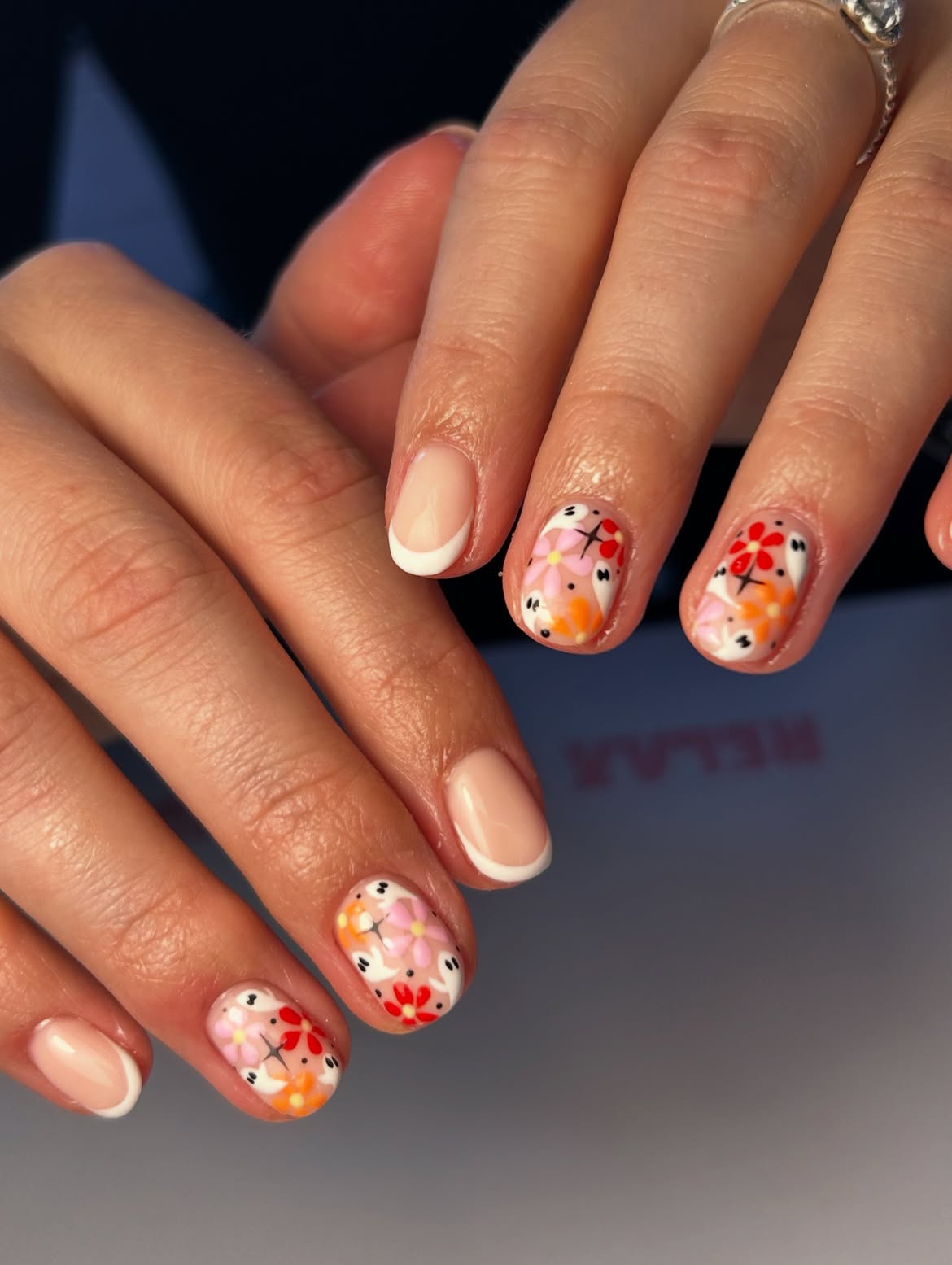 29 Spooky & Chic Halloween Nail Ideas for Short Nails 11 Playful Floral French Tip Short Nails