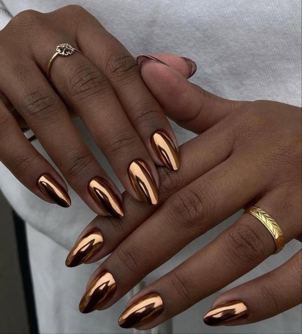 Rose Gold Chrome Almond Stiletto Nails