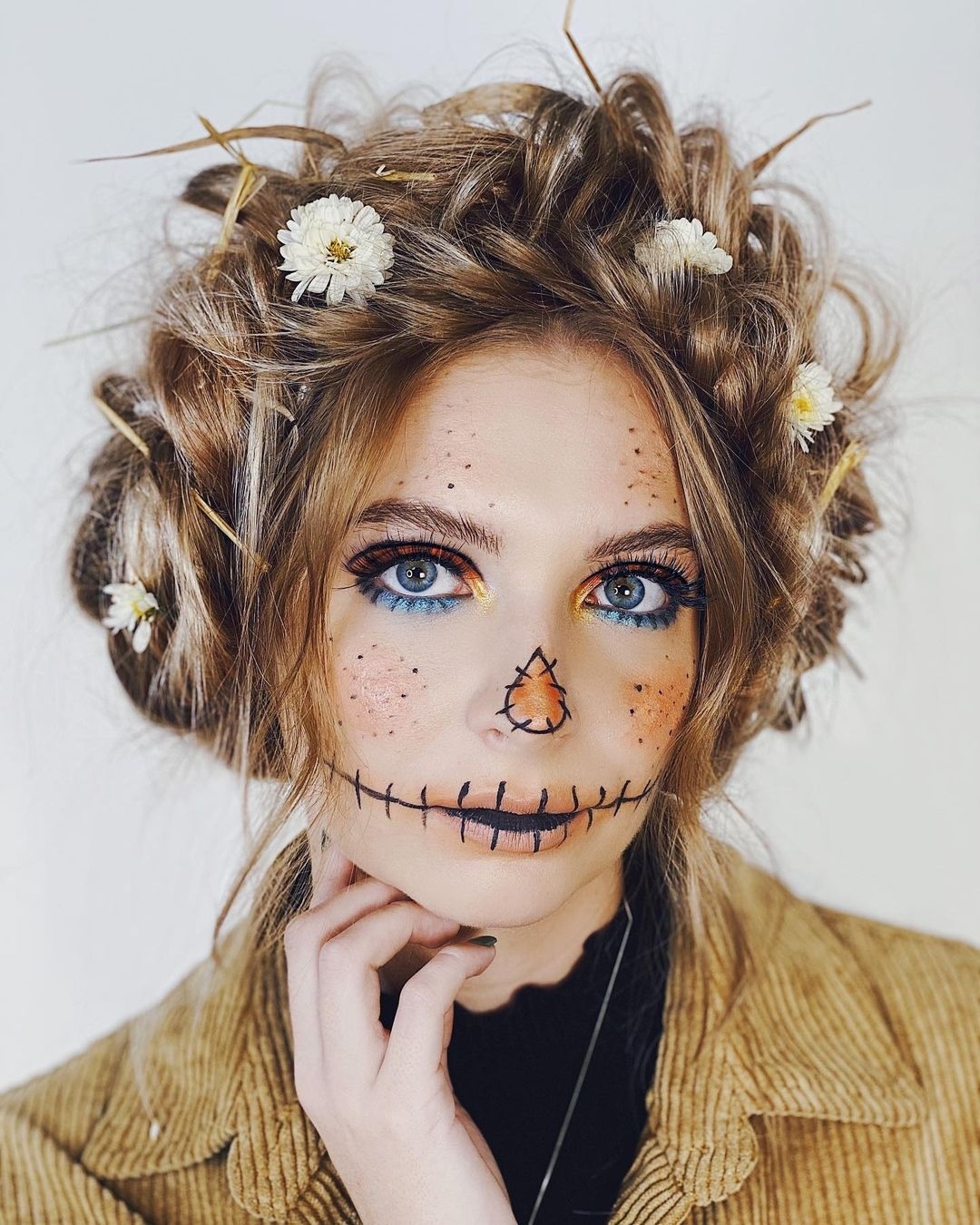 Scarecrow Inspired Tousled Updo With Flowers