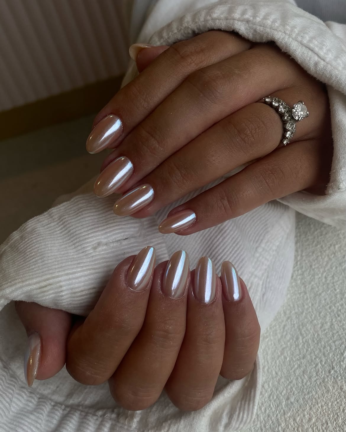 Shimmering Pearl Chrome Almond Nails