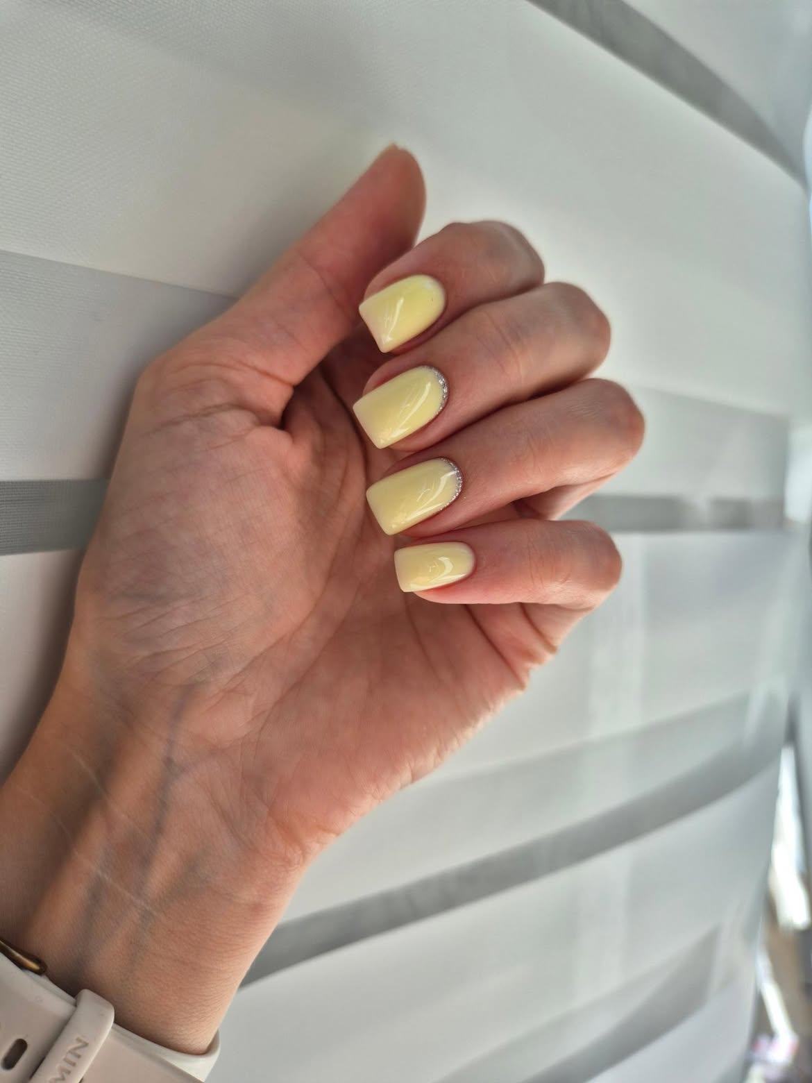 Soft Butter Yellow French Tips with Glitter Accent