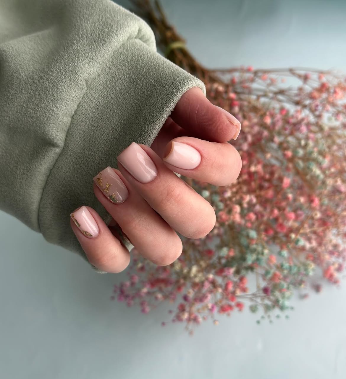 Soft Pink Nails with Gold Flakes Accent