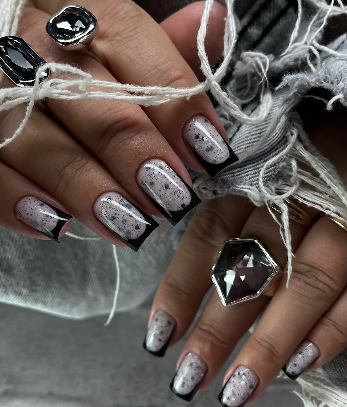 Speckled Black Glossy French Tip Nails
