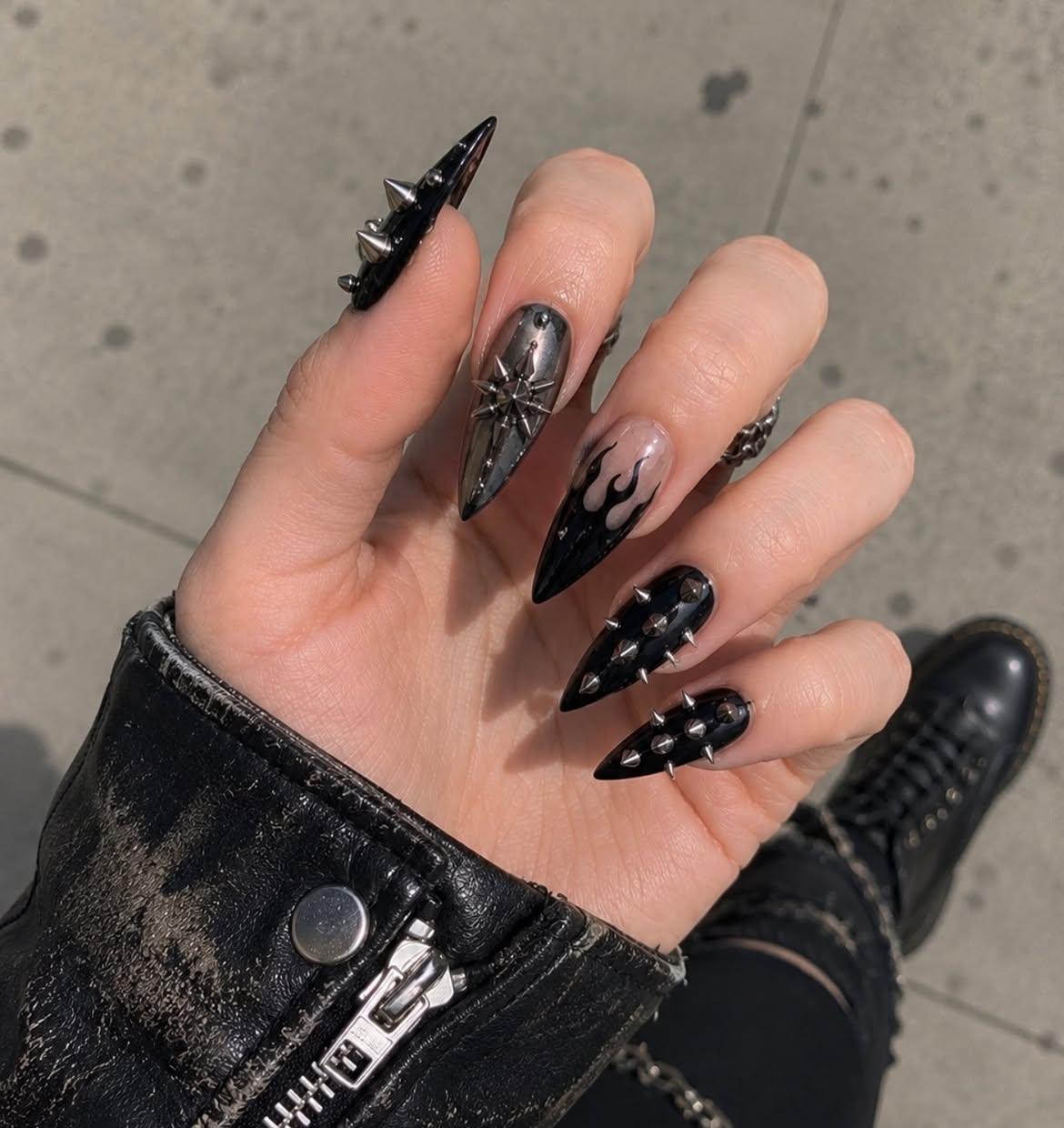 28 Spooktacular Halloween Nail Ideas You Need To Try 27 Spiked Black Flamethrower Stiletto Nails
