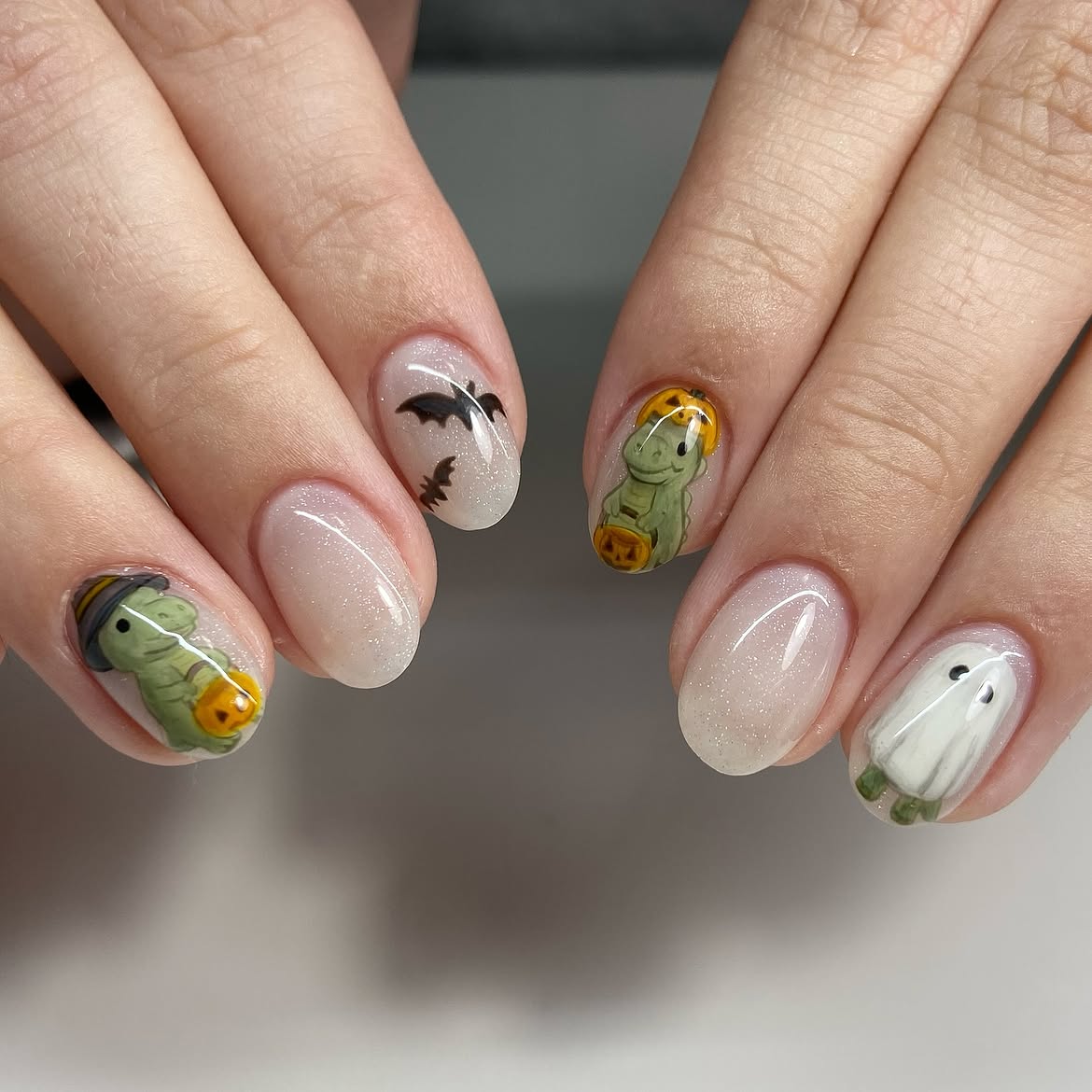 29 Spooky & Chic Halloween Nail Ideas for Short Nails 16 Spooky Cute Halloween Dinosaur & Ghost Nails