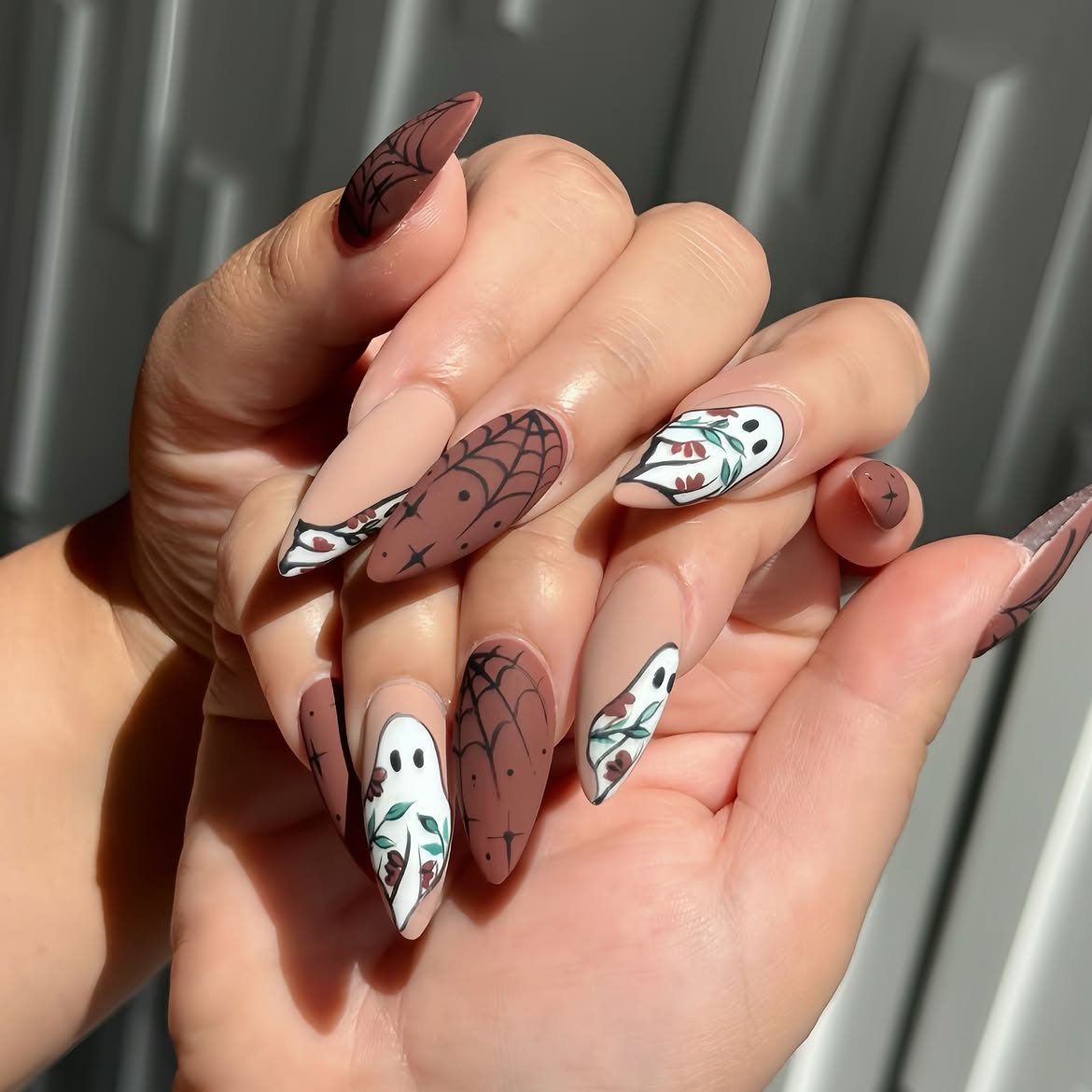 28 Spooktacular Halloween Nail Ideas You Need To Try 20 Spooky Ghost and Spiderweb Halloween Almond Nails
