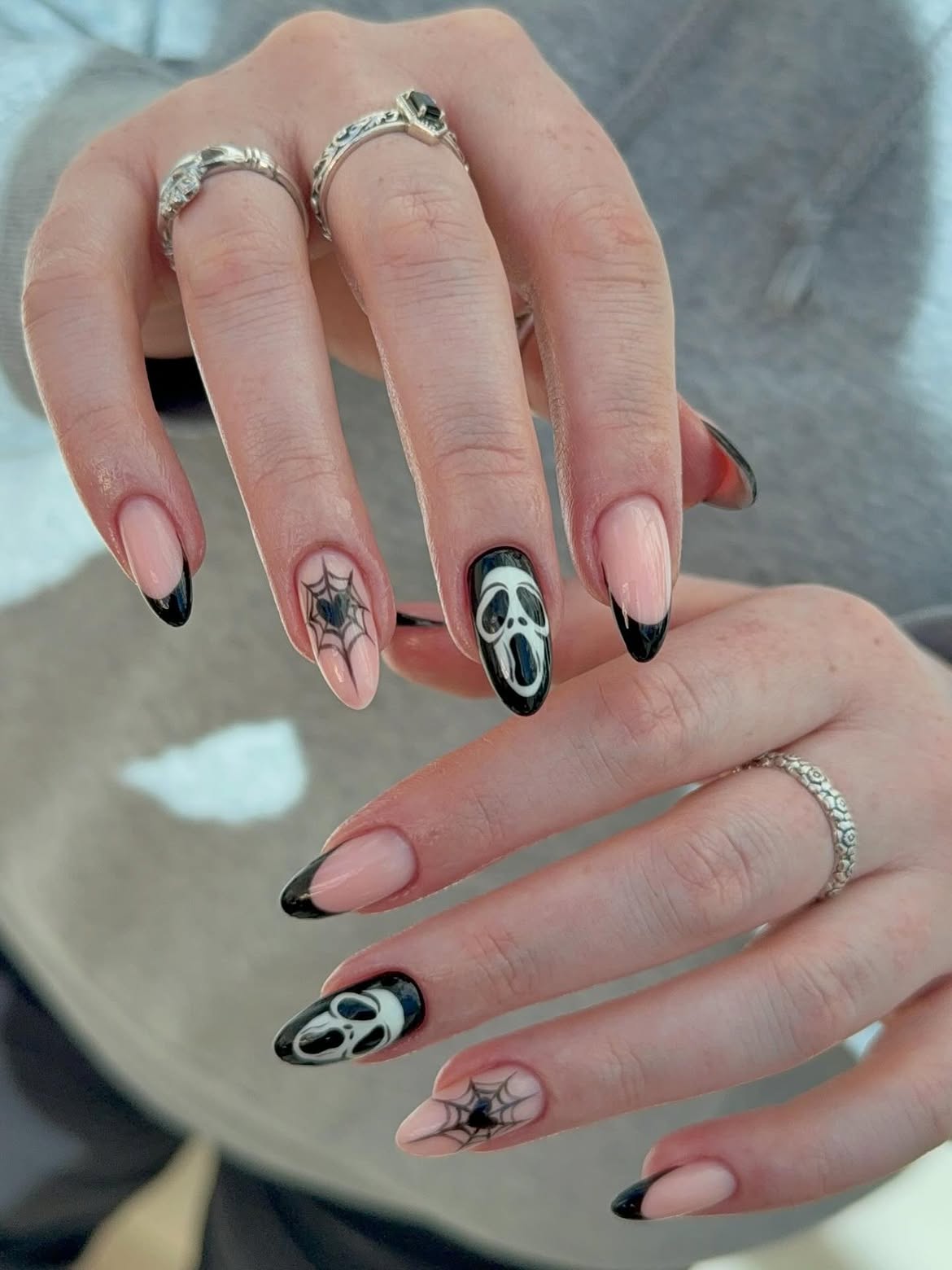 28 Spooktacular Halloween Nail Ideas You Need To Try 11 Spooky Ghost Face And Spiderweb French Tips