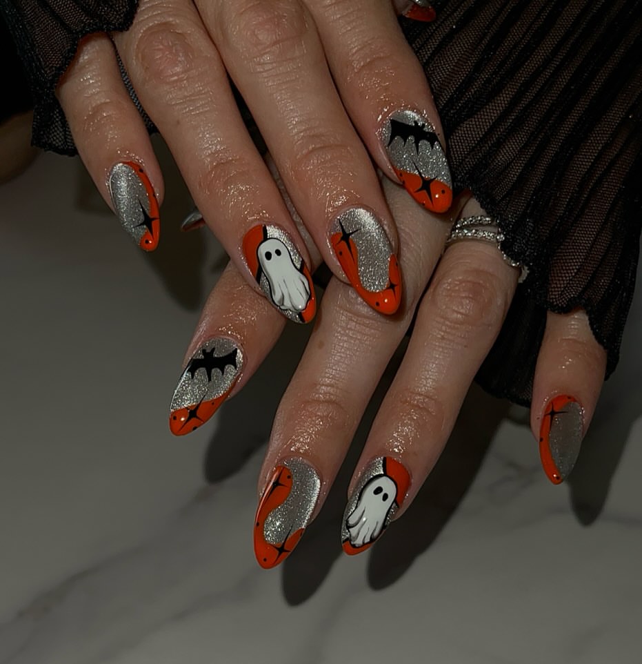 28 Spooktacular Halloween Nail Ideas You Need To Try 15 Spooky Halloween Ghost and Bat Nail Art