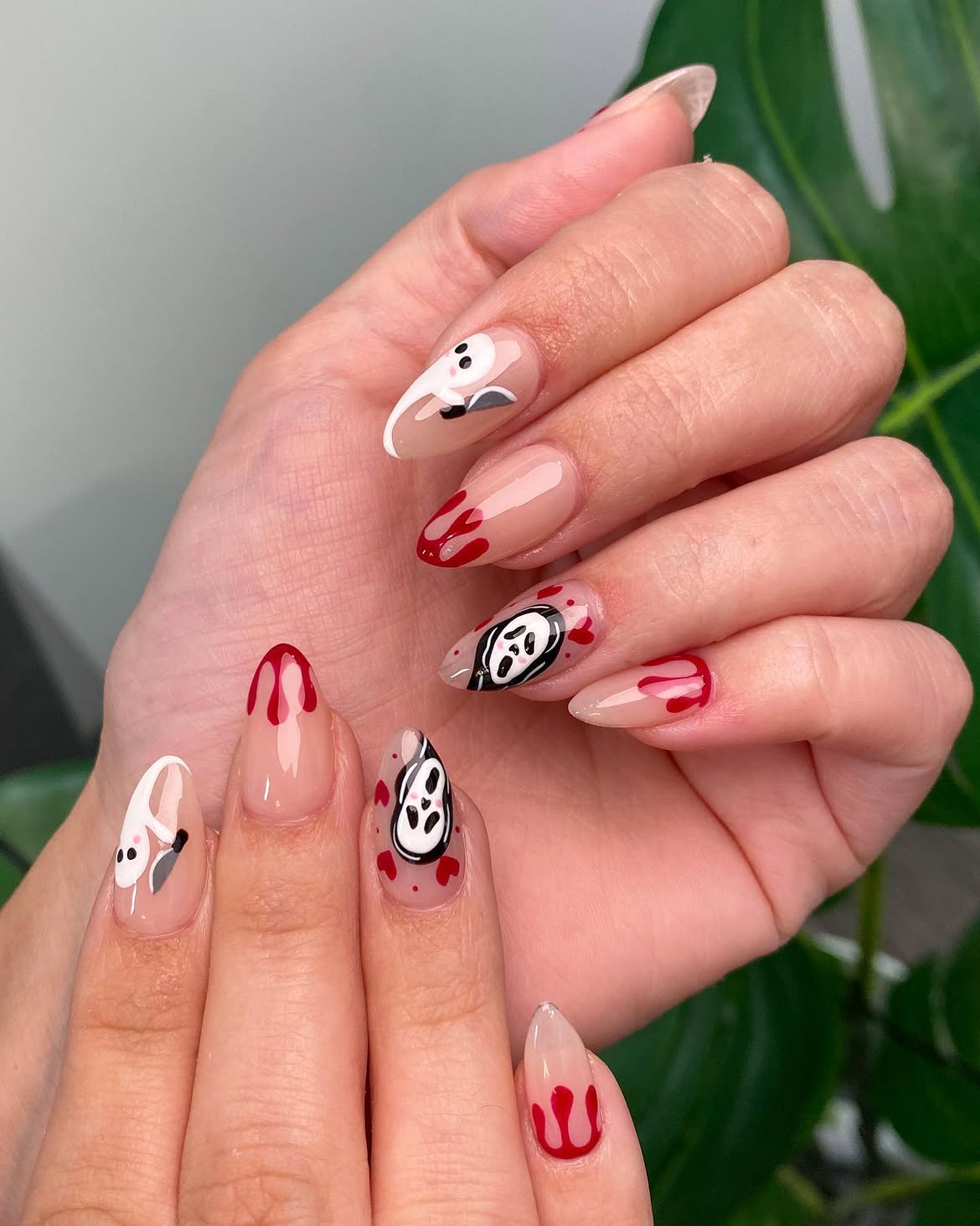 28 Spooktacular Halloween Nail Ideas You Need To Try 22 Spooky Halloween Ghost and Bloody Knife Nails