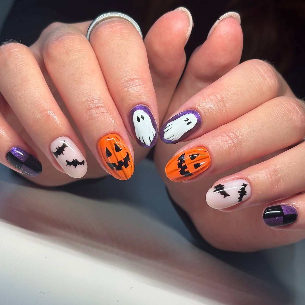 28 Stunning Pumpkin Nail Ideas for a Chic Fall Look 20 Spooky Halloween Pumpkin and Ghost Nail Art