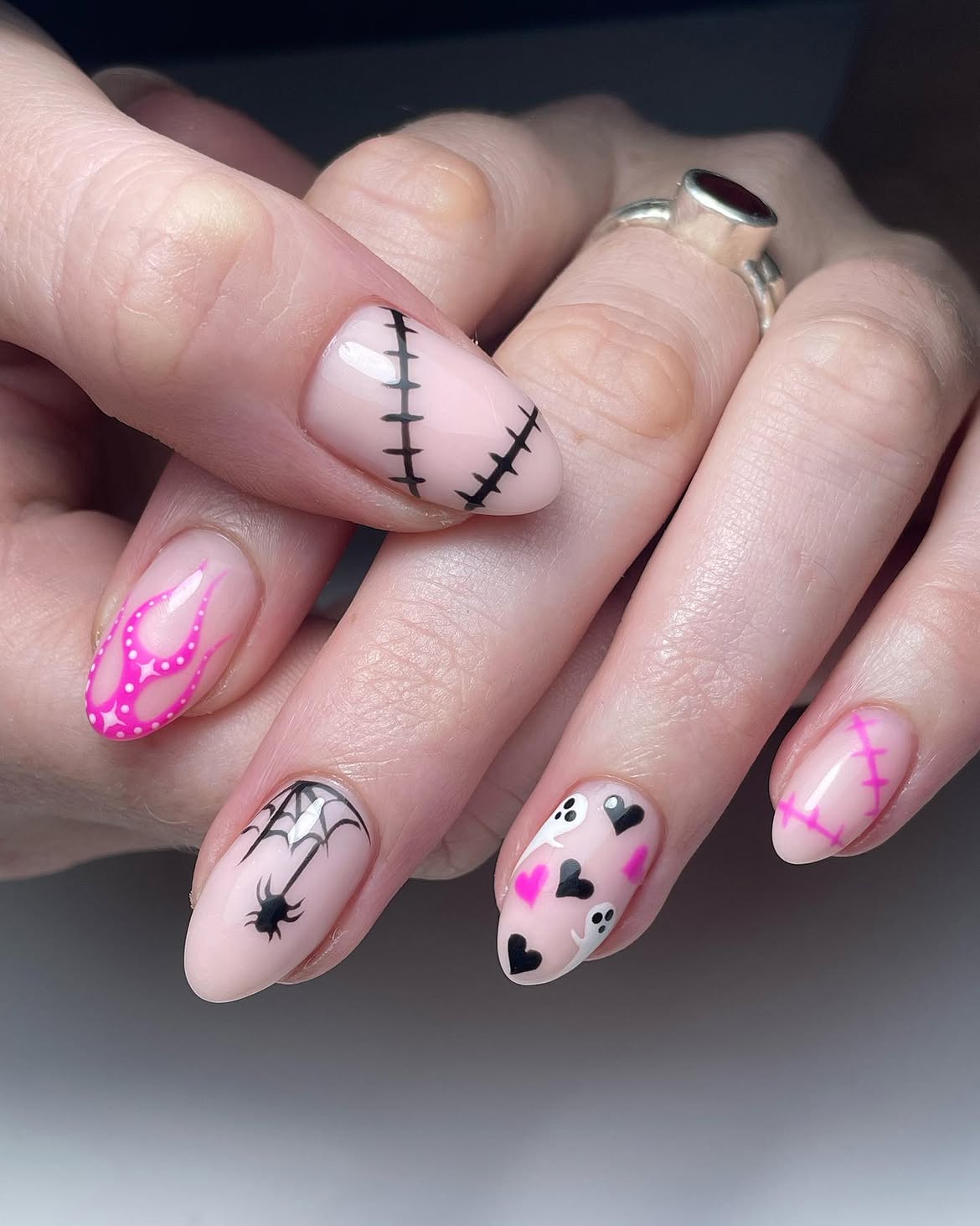 27 Spooktacular Pink Halloween Nail Ideas You Need 6 Spooky Pink Halloween Almond Nails