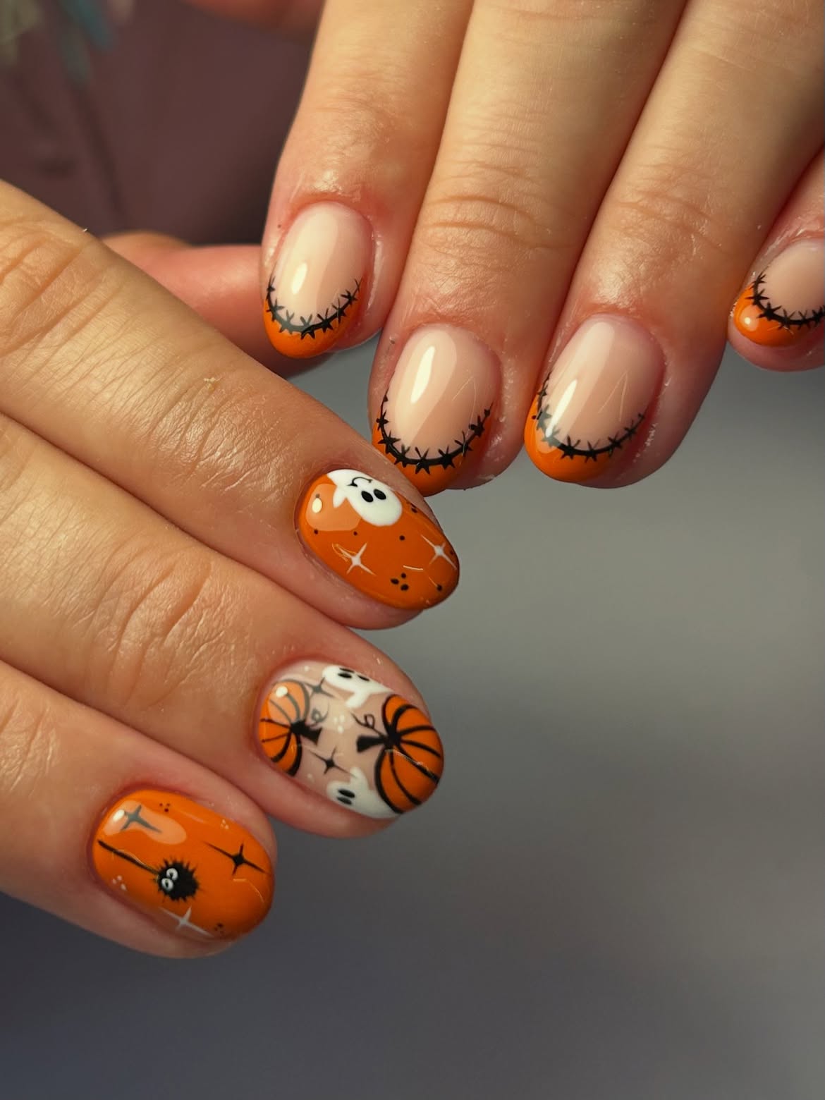 29 Spooky & Chic Halloween Nail Ideas for Short Nails 12 Spooky Pumpkin French Tips with Ghosts