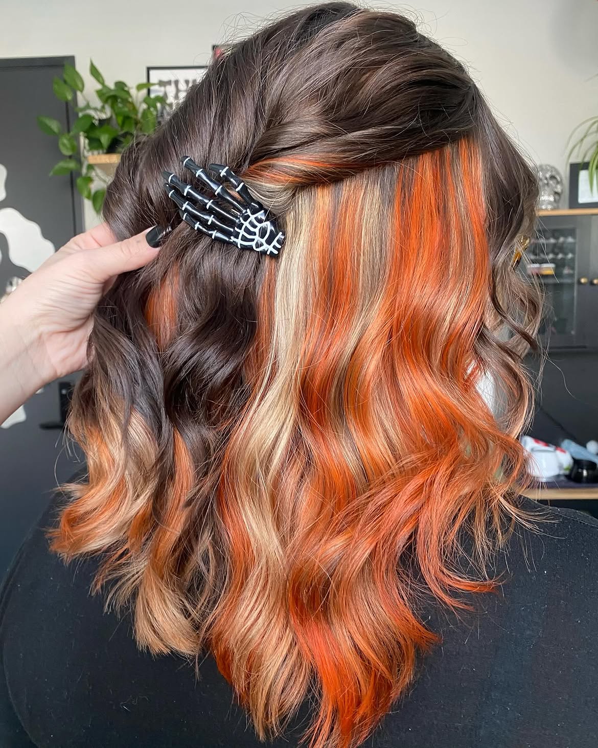 Spooky Skeleton Hand Clip with Fiery Orange Streaks