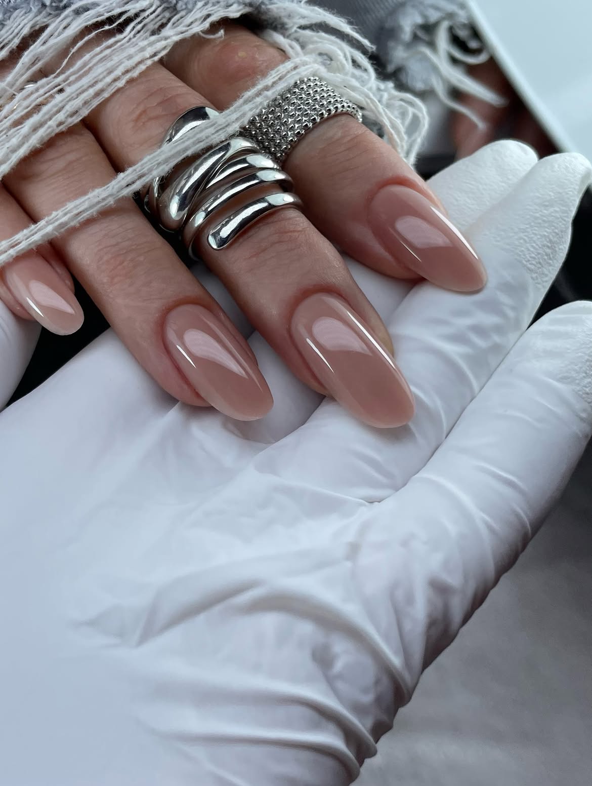 Translucent Taupe Almond Gel Nails