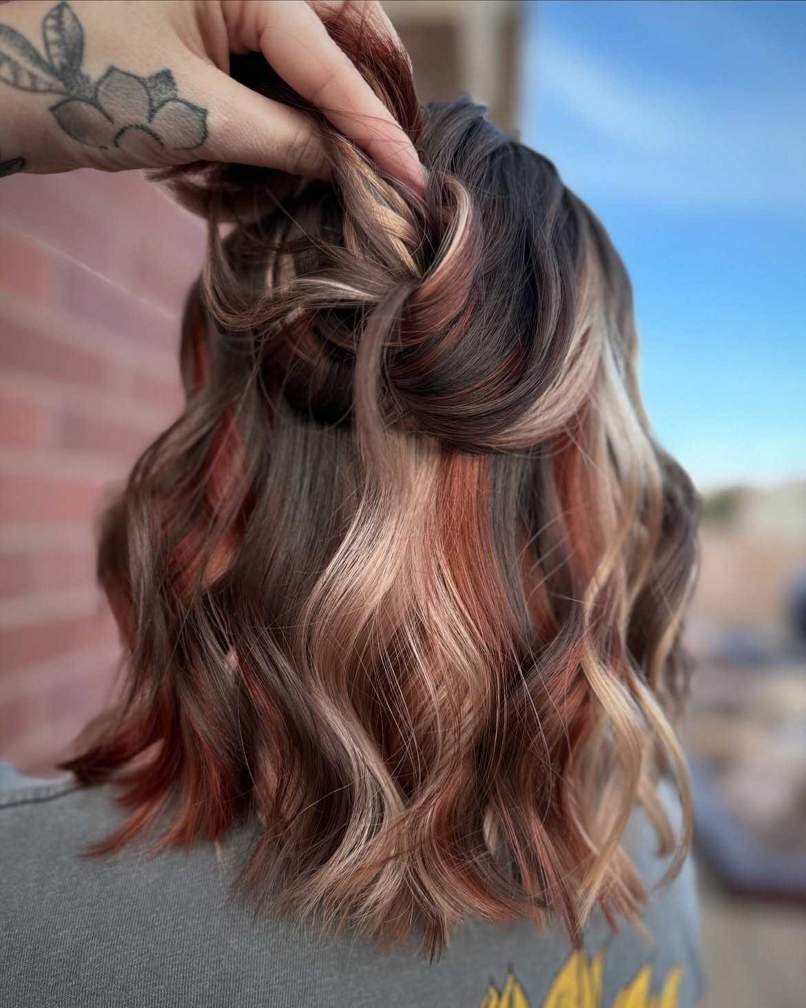 Trendy Copper and Blonde Peekaboo Highlights