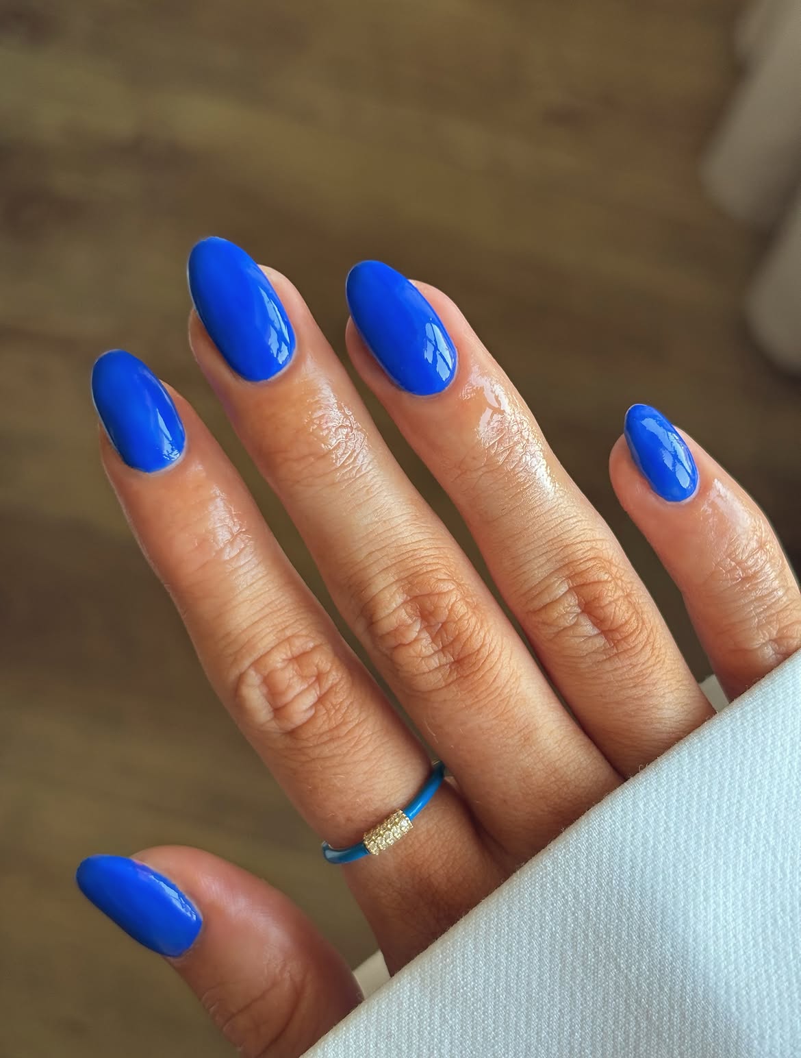 Vibrant Cobalt Blue Glossy Almond Nails