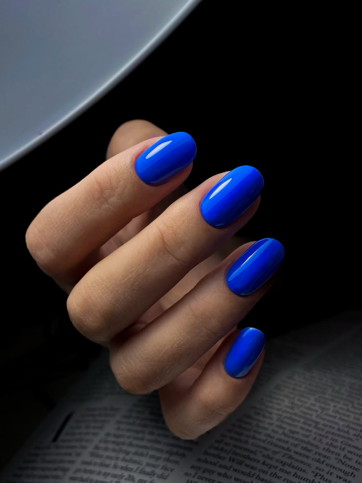 Vibrant Electric Blue Glossy Oval Nails