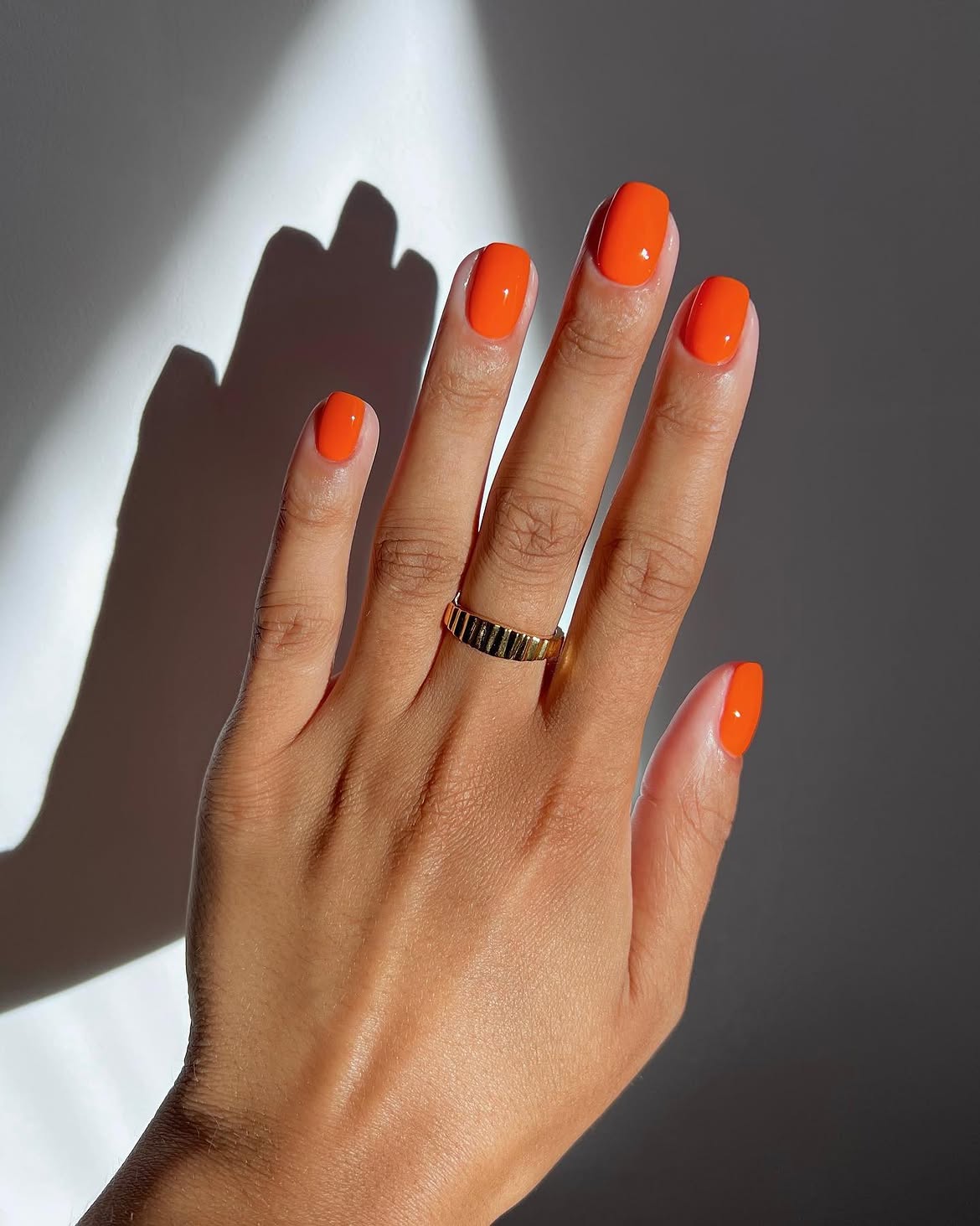 28 Stunning Orange Fall Nail Ideas You Need to Try 23 Vibrant Pumpkin Orange High Gloss Nails
