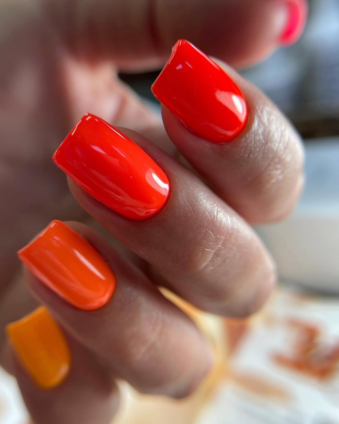 Vibrant Sunset Orange and Neon Coral Glossy Nails