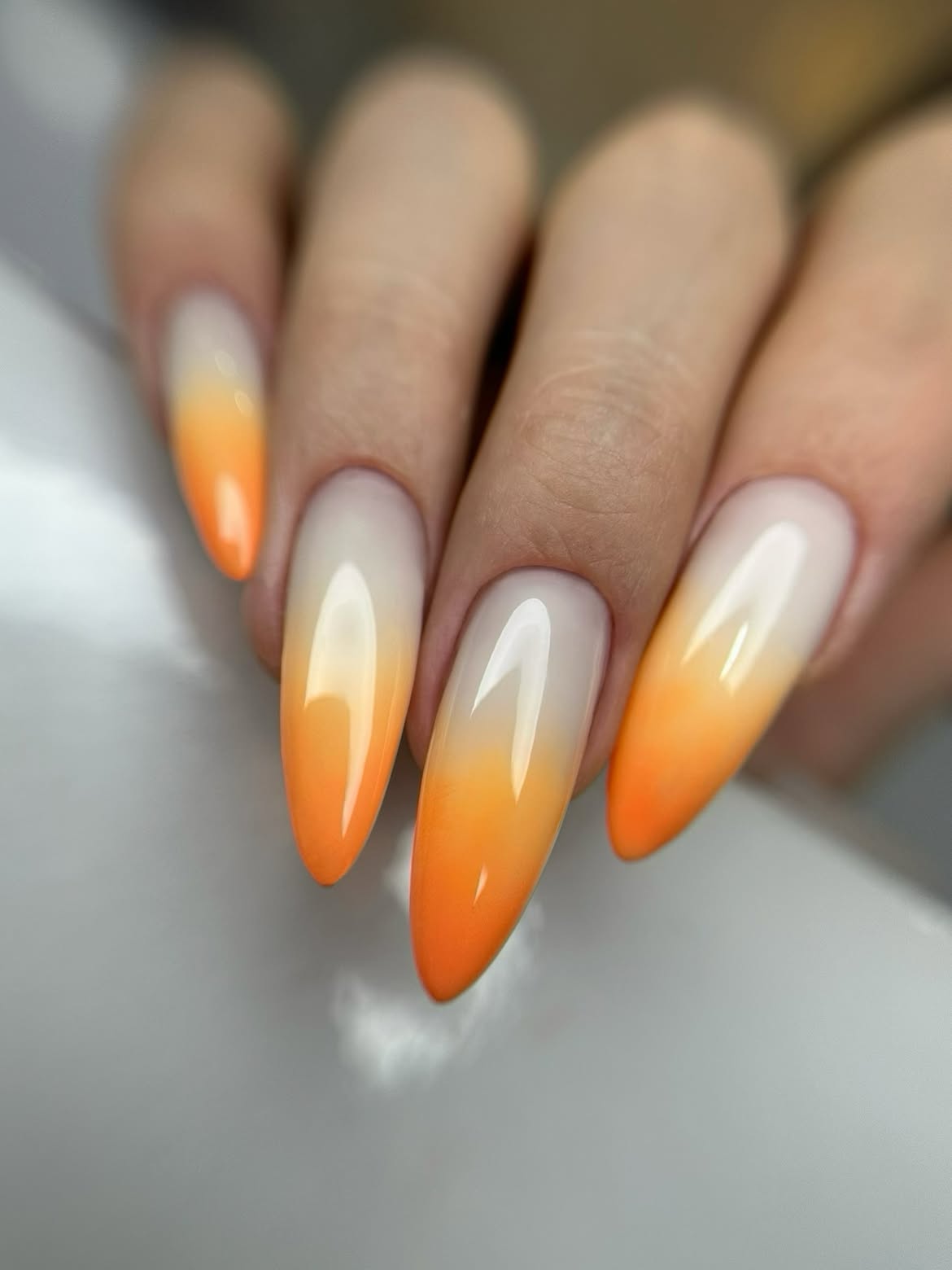 Vibrant Sunset Orange Ombre Almond Nails