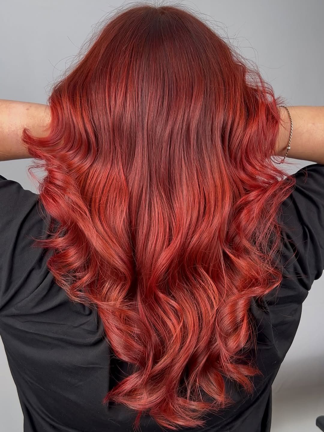 Vivid Cherry Red Waves With Face-Framing Layers