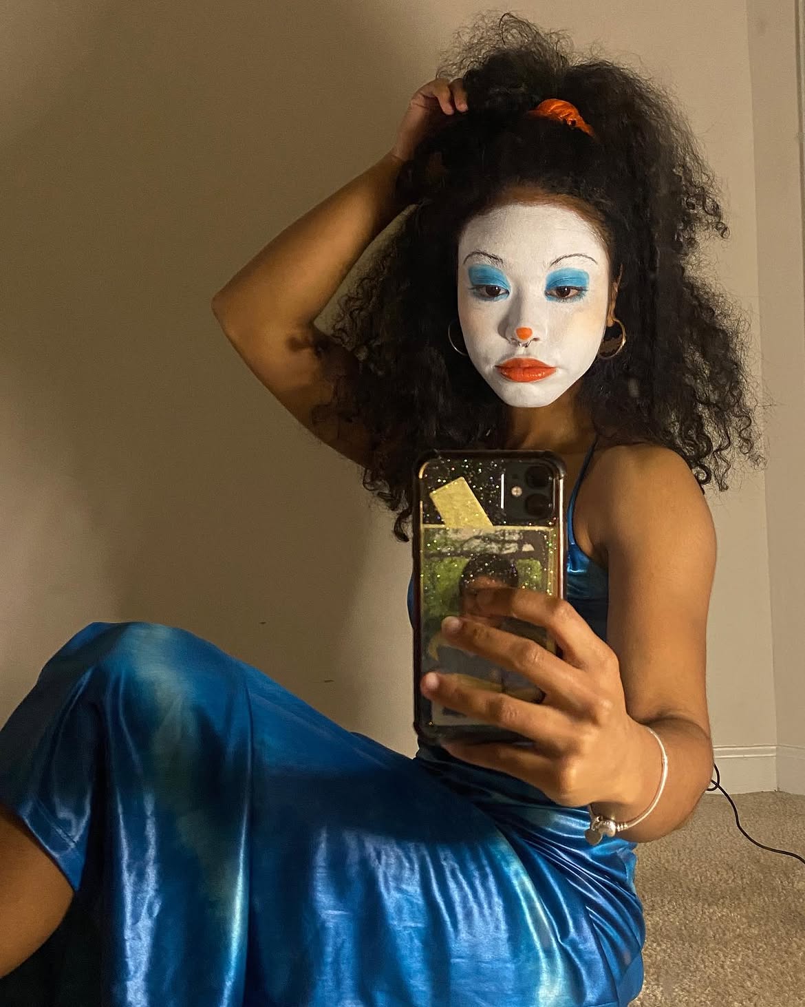 Voluminous Clown Hair With Orange Scrunchie