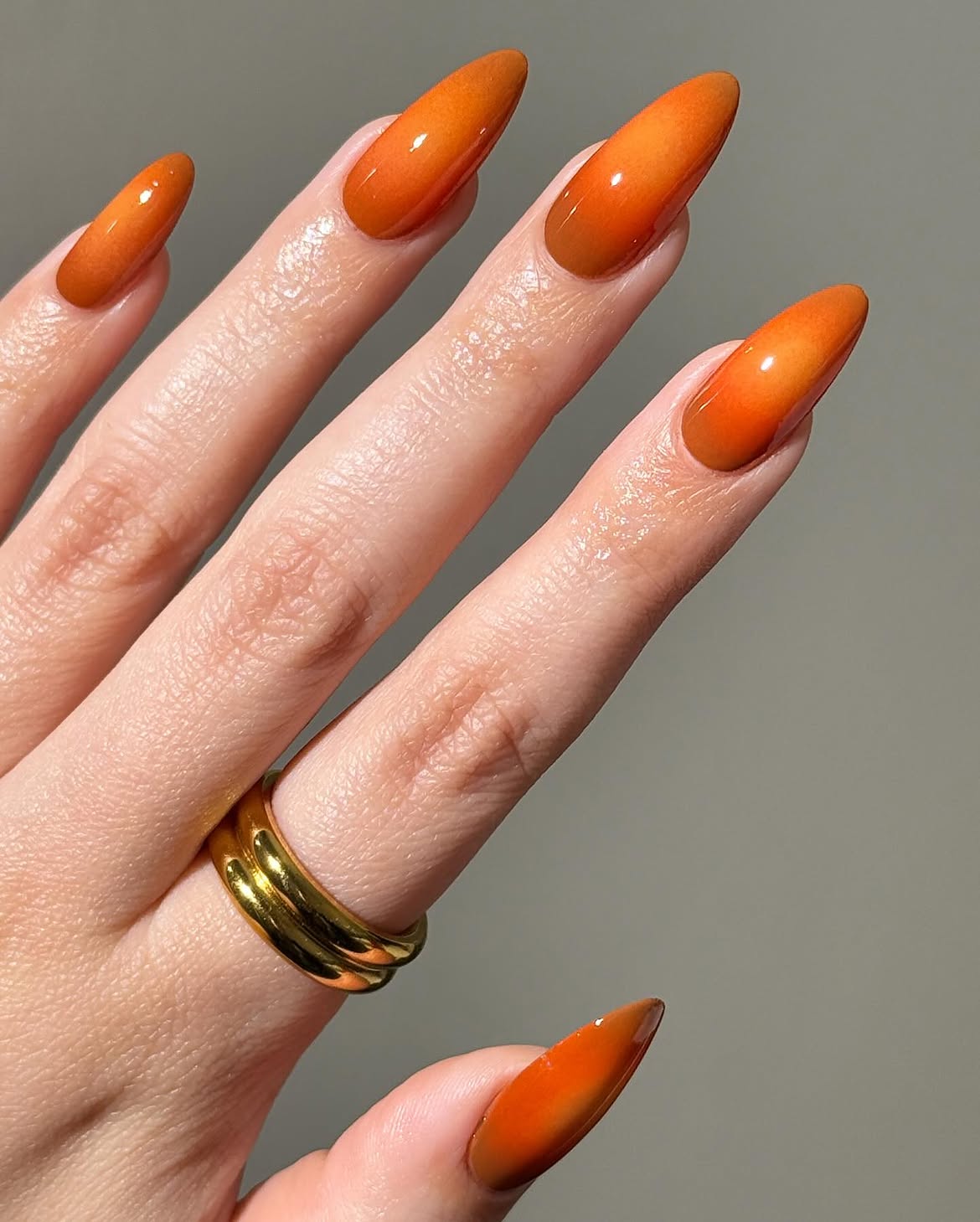 28 Stunning Orange Fall Nail Ideas You Need to Try 6 Warm Amber Orange Ombre Almond Nails