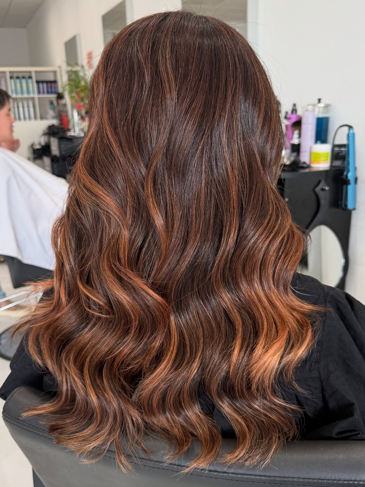 Warm Auburn Highlights On Dark Chestnut Waves