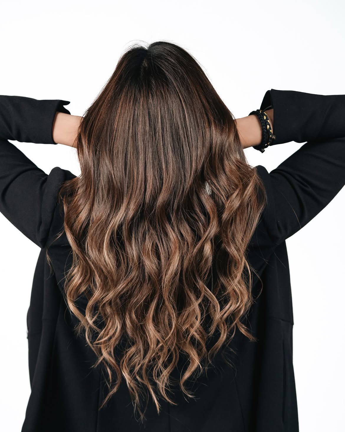Warm Bronde Balayage With Loose Beach Waves