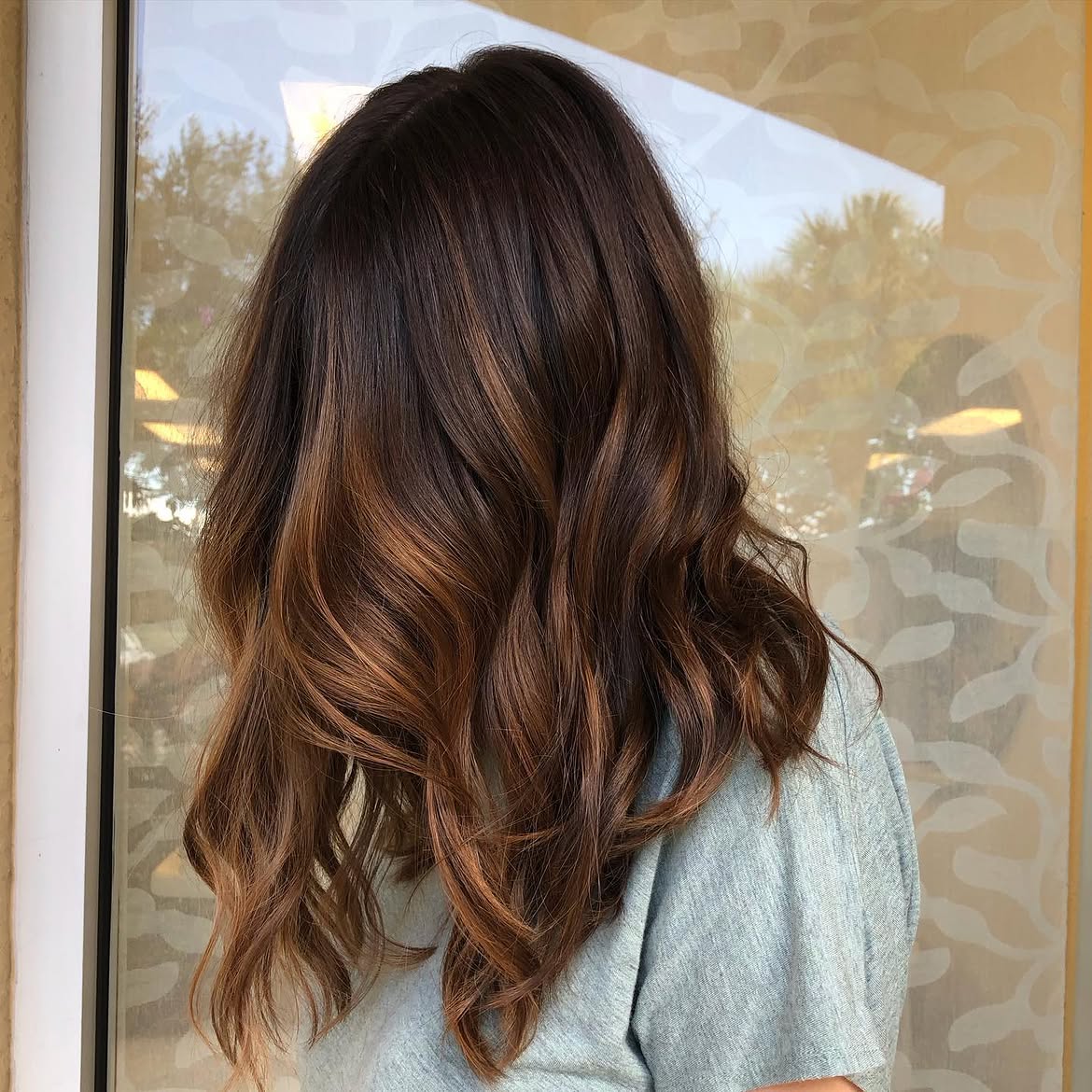Warm Bronze Balayage On Dark Brown Waves