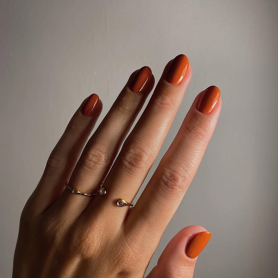 28 Stunning Orange Fall Nail Ideas You Need to Try 16 Warm Burnt Orange Glossy Oval Nails