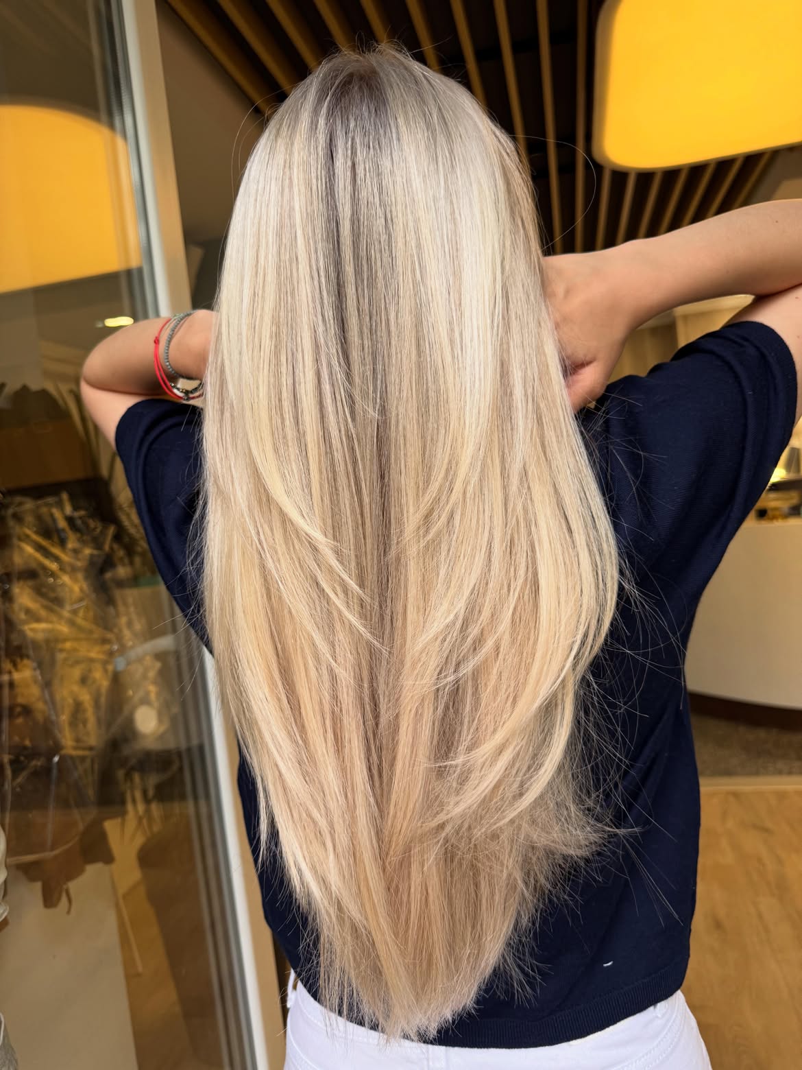Warm Butter Blonde With Face-Framing Layers