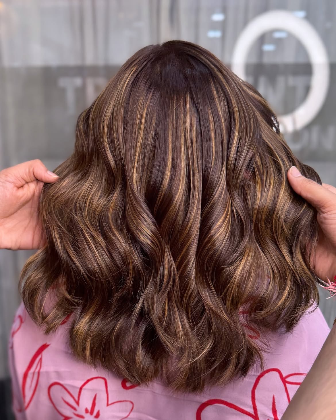 Warm Caramel Highlights On Wavy Brown Lob