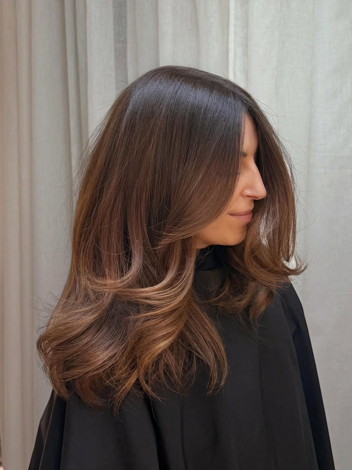 Warm Chocolate Brown Balayage With Face-Framing Layers