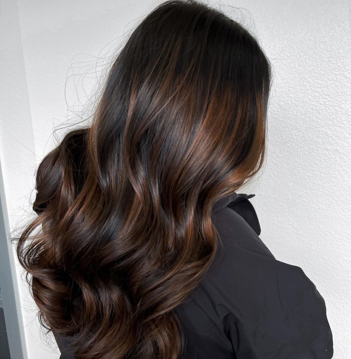 Warm Cinnamon Balayage On Dark Brown Waves