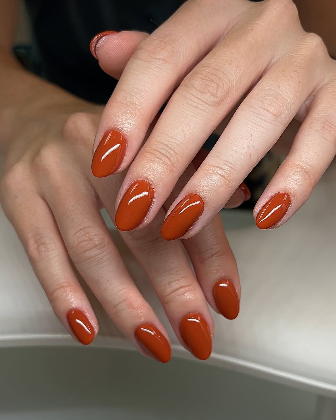 27 Must-Try Early Fall Nail Ideas For A Chic Autumn Vibe 27 Warm Terracotta High Gloss Oval Nails