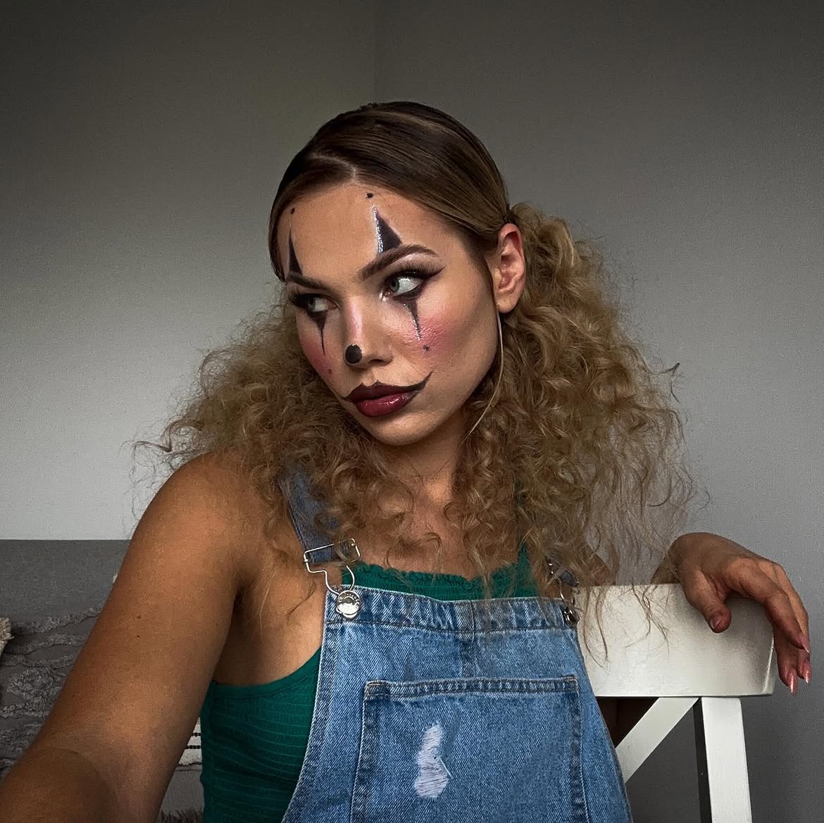 Wavy Pigtails With Clown Makeup Twist