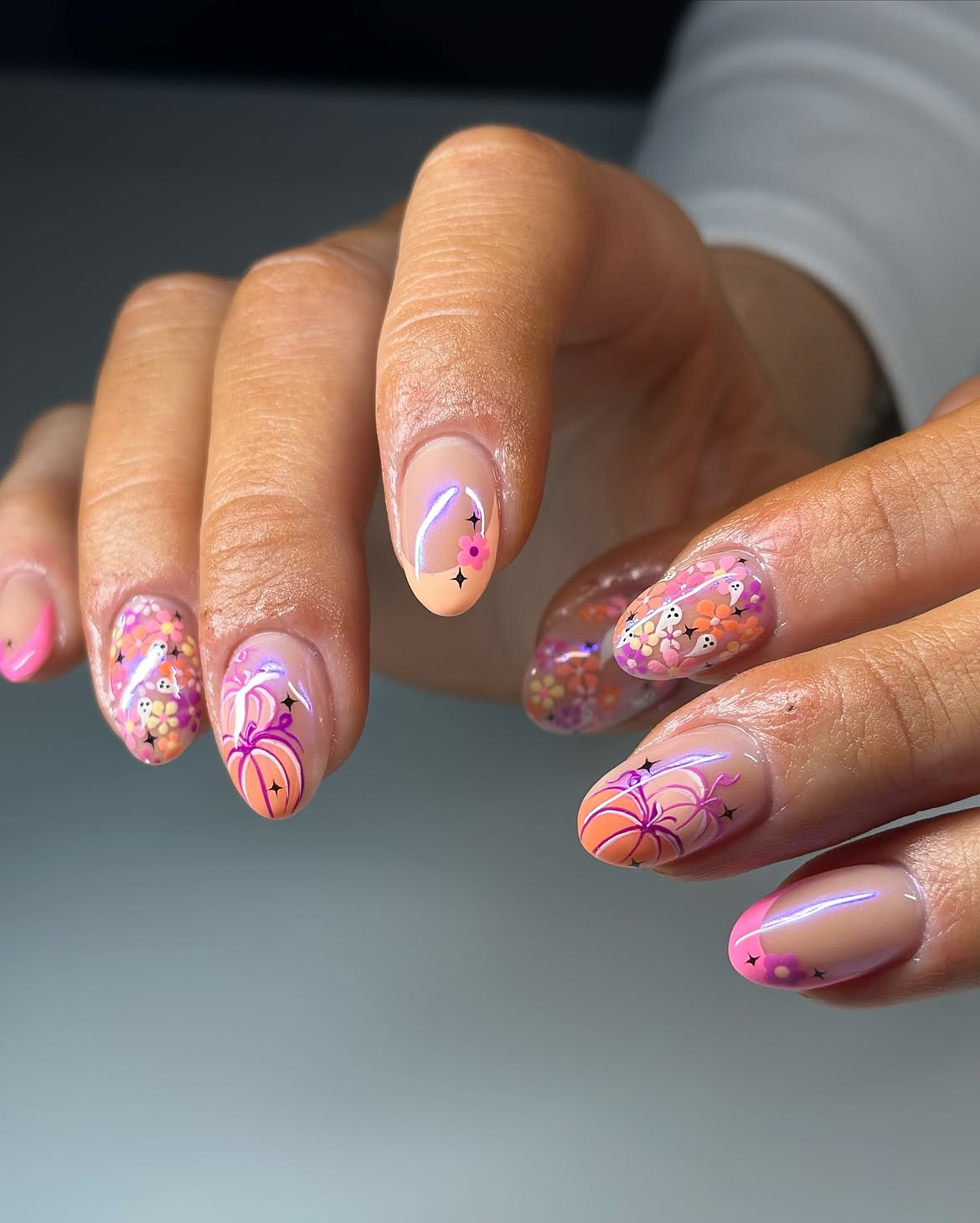 27 Spooktacular Pink Halloween Nail Ideas You Need 7 Whimsical Pink Halloween Pumpkin & Ghost French Tips