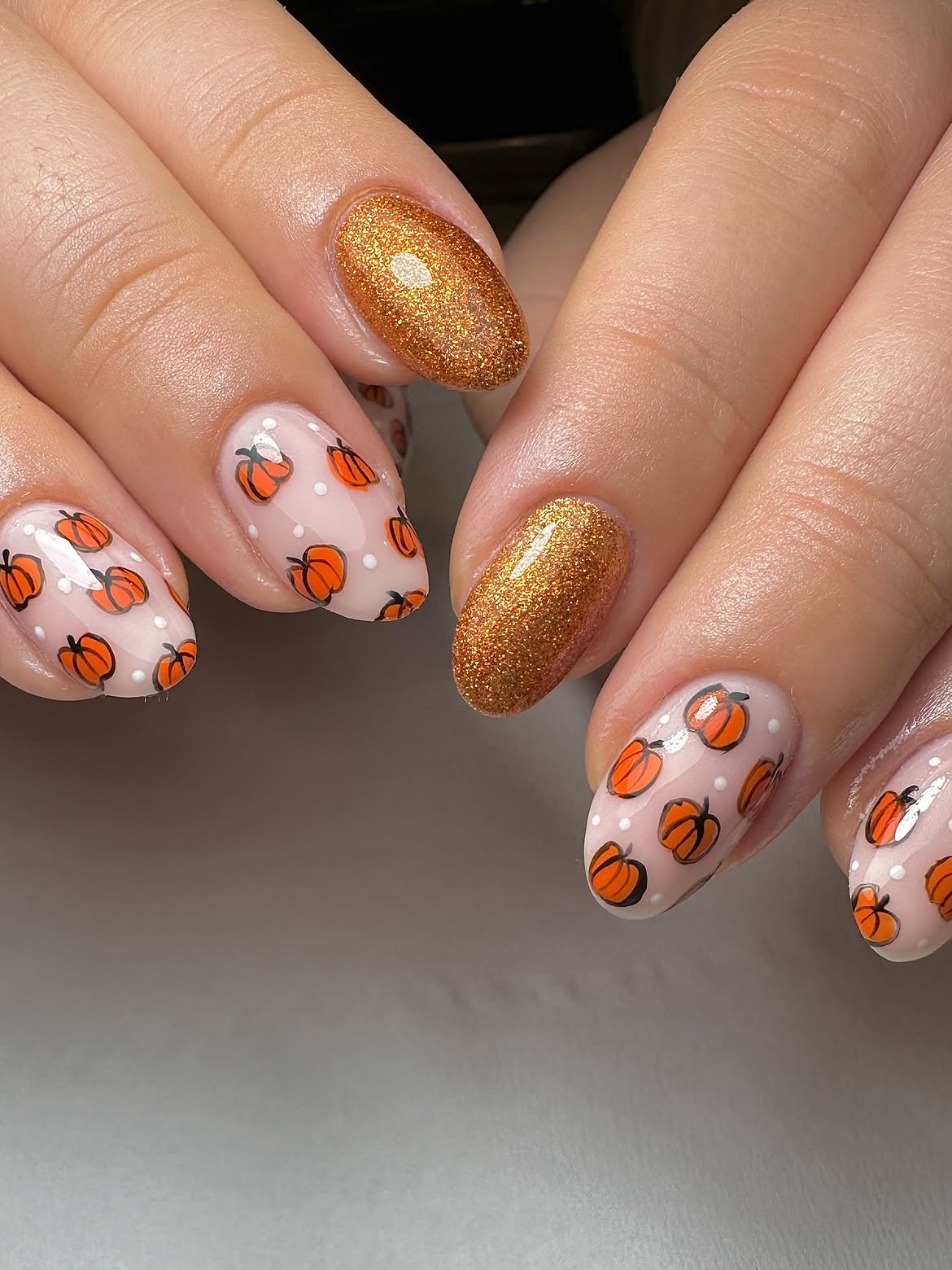 28 Stunning Pumpkin Nail Ideas for a Chic Fall Look 17 Whimsical Pumpkin Patch Oval Nails