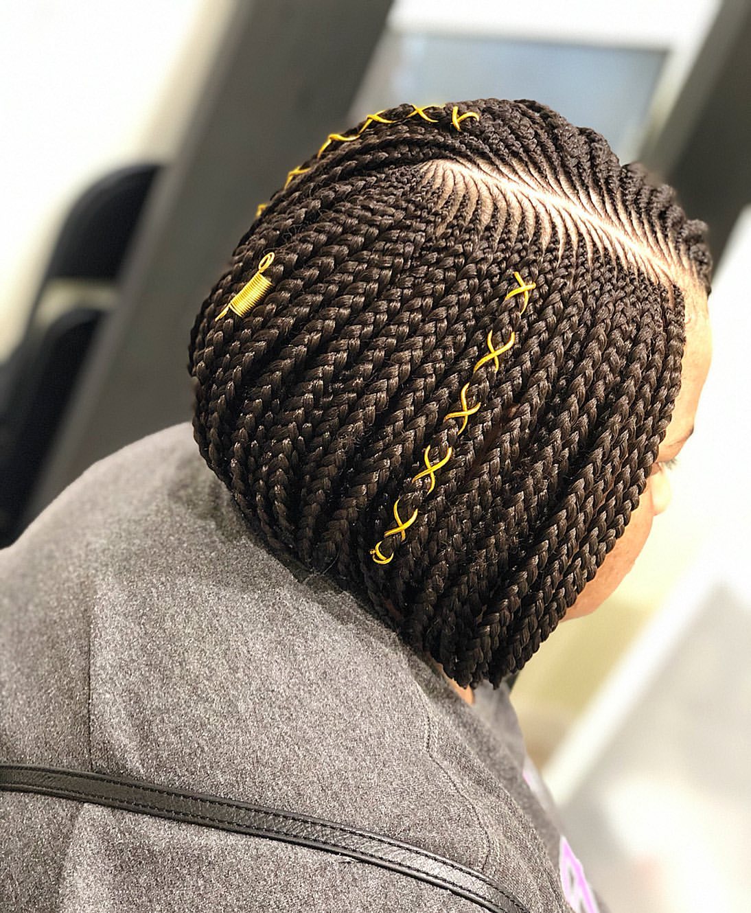Asymmetrical Bob Braids With Gold Cord Accents