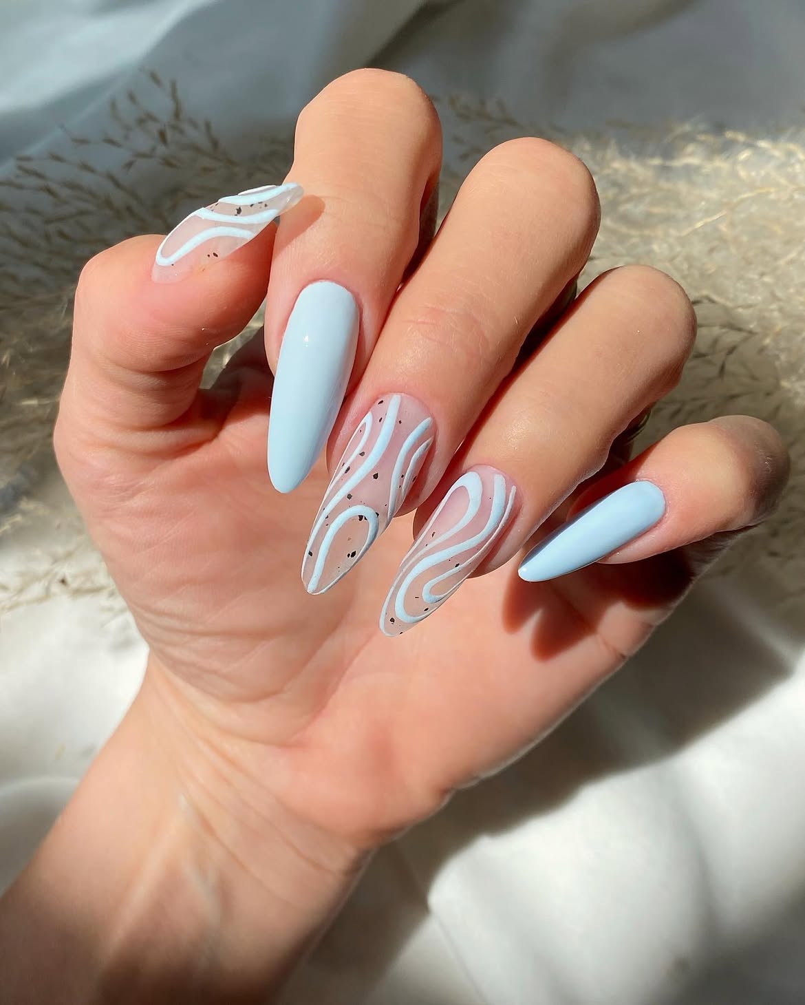Baby Blue Swirl Abstract Almond Nails