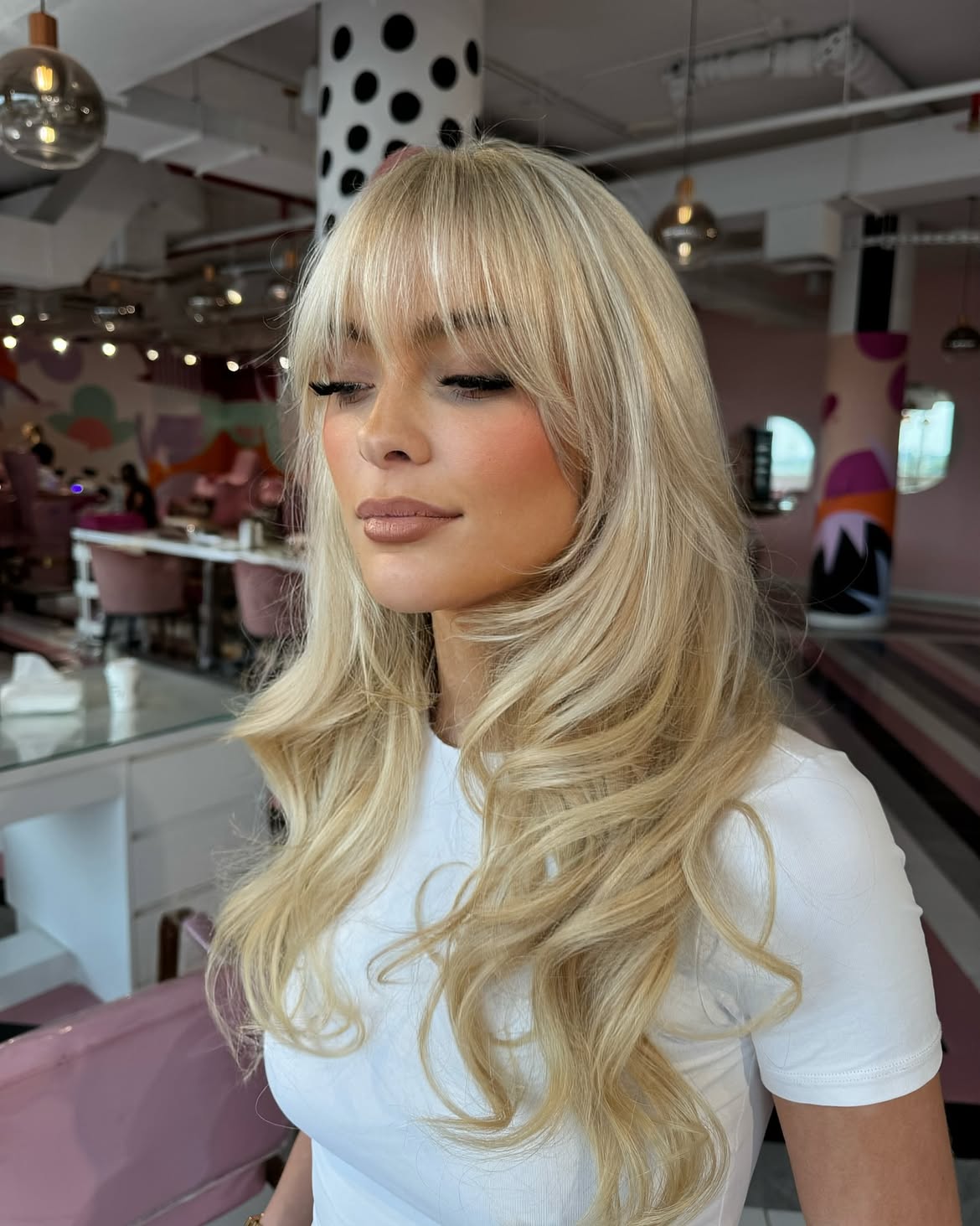 Blonde Layers With Wispy Curtain Bangs