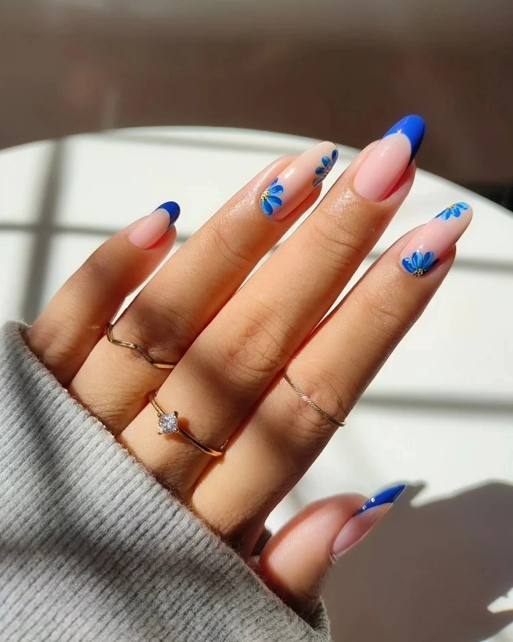 Blue French Tip Almond Nails with Daisy Art