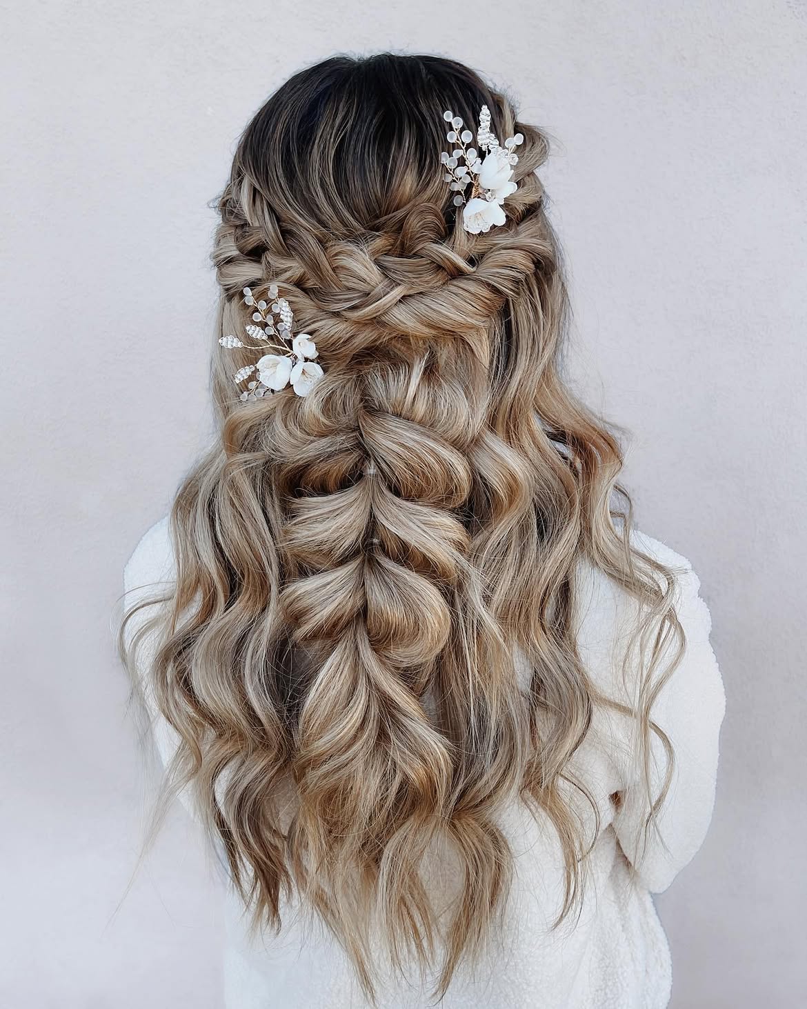 Boho Braids With Loose Waves and Floral Pins