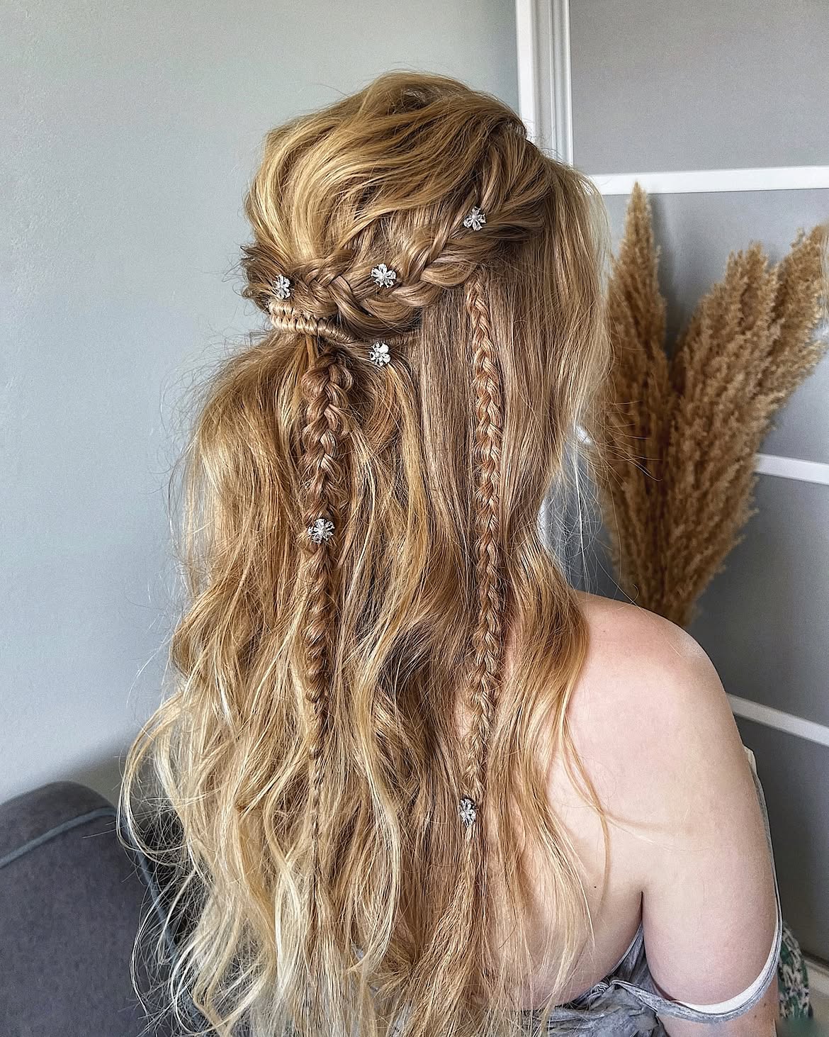 Boho Braids With Wavy Hair And Flower Charms