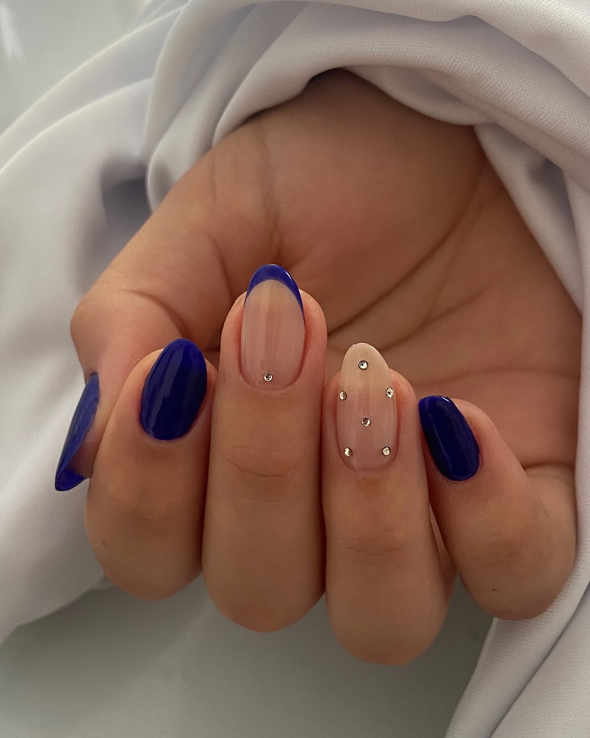 Bold Blue French Tips With Rhinestone Accents