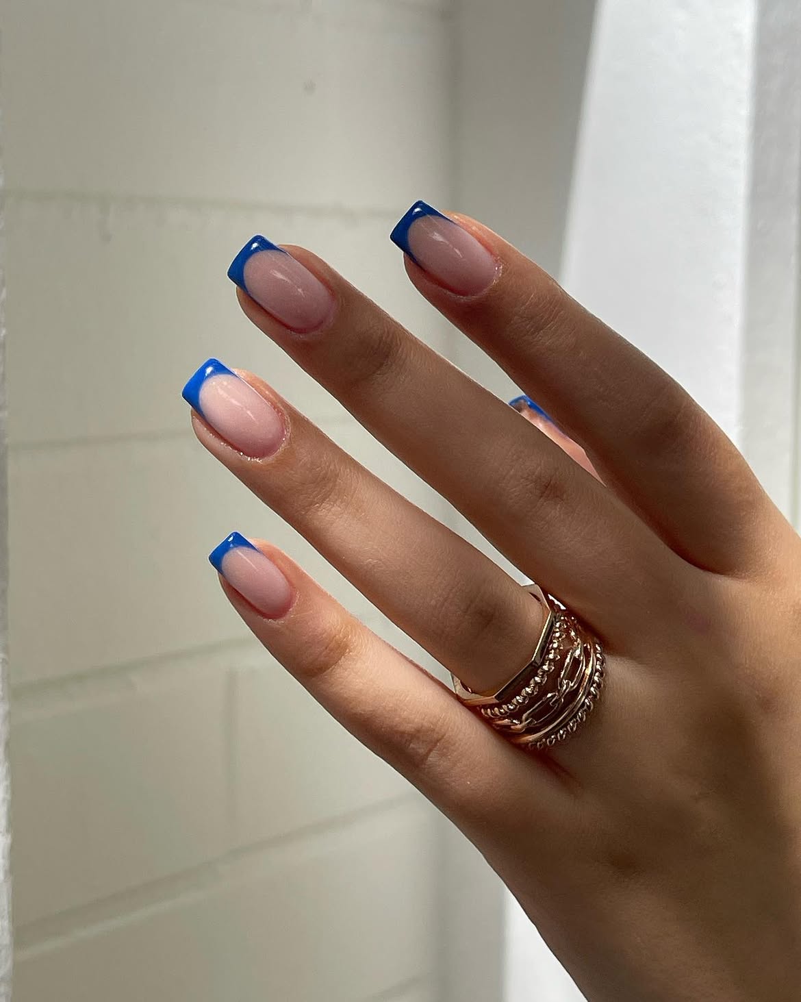 Bold Blue Tip French Manicure