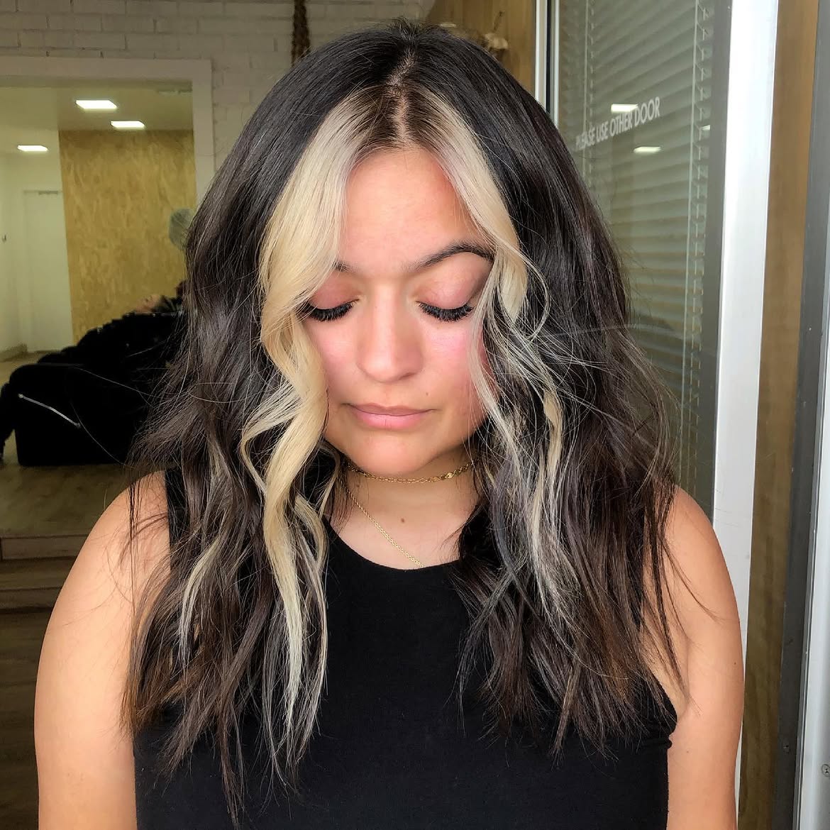 Bold Platinum Money Piece On Dark Wavy Lob