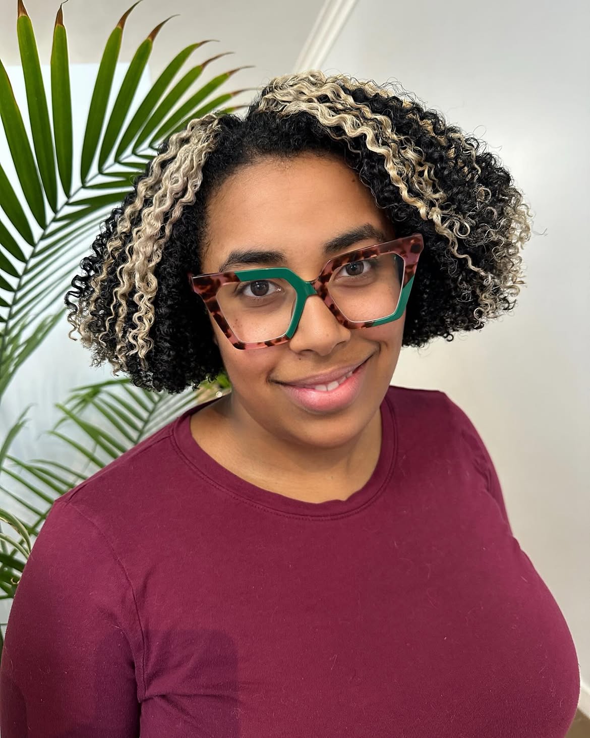 Bold Skunk Stripe Curls With Contrast