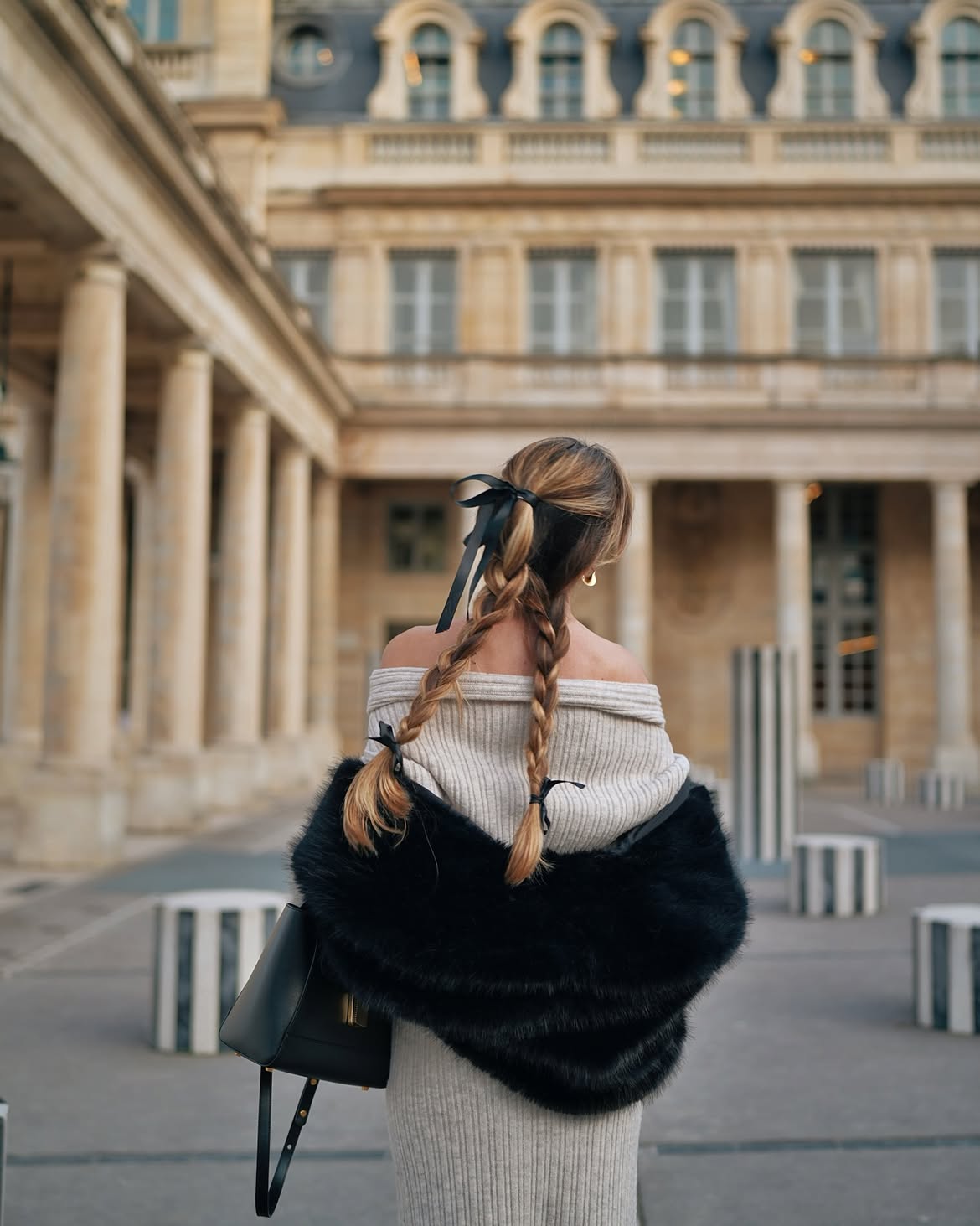 Braided Pigtails With Black Ribbon Accents